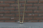 Detail van Nordstahl Hairpin meubelpoot goud